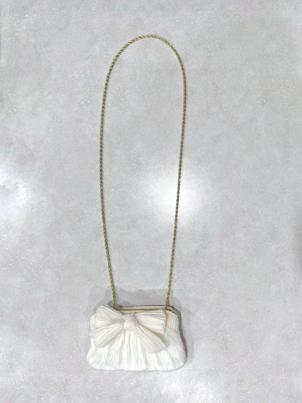 loeffler randall mini pearl rayne bow clutch